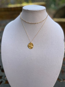 Gold cross necklace